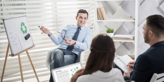 three people in a business meeting