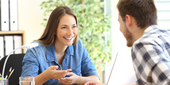 two people talking happy