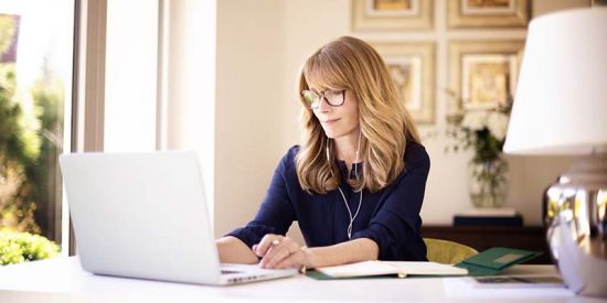 woman working on laptop and working from home