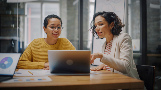 woman being thought new manager skills