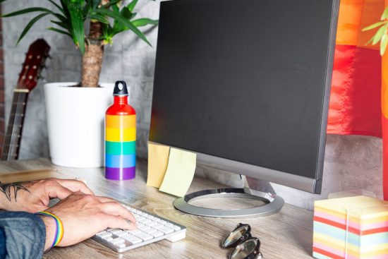 lgbtq employee working on computer